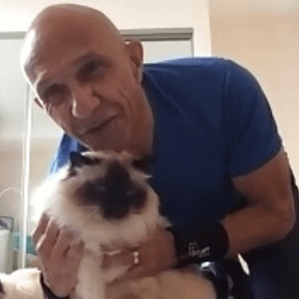 Rick and his cat exercising with Sheila Hamilton Movement Garden